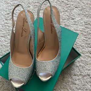 Heels for dance or formal event. Silver sparkly iridescent. Worn once.